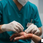 doctor treating a Degloving Injury
