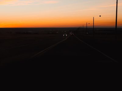 long, straight, and monotonous highway at dusk - highway hypnosis