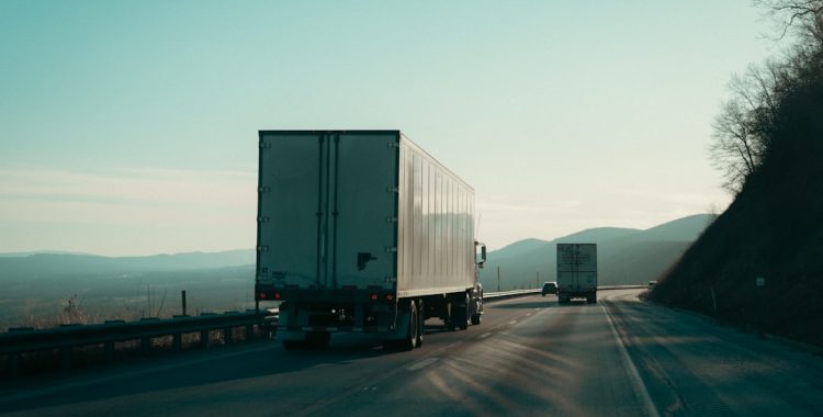 semi truck on highway - how much does a semi truck weigh